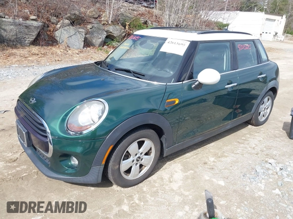 2016 MINI Hardtop 4 Door with VIN WMWXU1C57G2D09401, listed as a IAAI auction lot 42013695 with 43,437 mi miles and . Bid and sale history available at DreamBid. Image 2.
