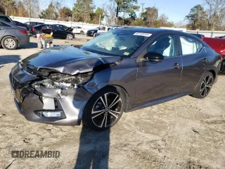 2021 Nissan Sentra SR with VIN 3N1AB8DV9MY330639, listed as a Copart auction lot 82703204 with 23,044 mi miles and Salvage Title. Bid and sale history available at DreamBid. Image 1.