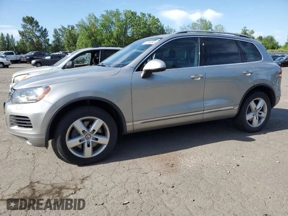 2012 Volkswagen Touareg с VIN WVGEG9BP6CD008533, выставлен на аукционе Copart как лот 60356345 с пробегом 103 270 миль миль и Чистый • Clean title. История ставок и продаж доступна на DreamBid. Изображение 1.