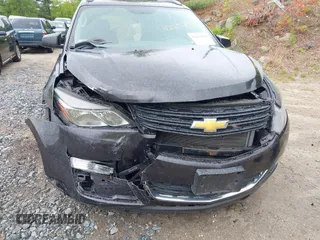 2015 Chevrolet Traverse LS z VIN 1GNKVFED2FJ133054, wystawiony jako IAAI lot #42252164 z przebiegiem 72 981 mil mil oraz . Historia ofert i sprzedaży dostępna na DreamBid. Obrazek 6.