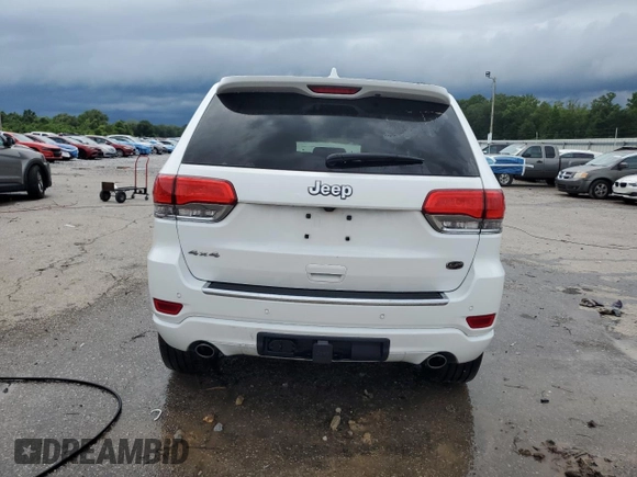 2015 Jeep Grand Cherokee Overland with VIN 1C4RJFCGXFC891616, listed as a Copart auction lot 61386065 with 90,011 mi miles and Salvage title. Bid and sale history available at DreamBid. Image 6.