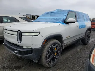 2023 Rivian R1S Adventure with VIN 7PDSGABA6PN017889, listed as a Copart auction lot 68860864 with 7,661 mi miles and Salvage Title. Bid and sale history available at carsss.com. Image 1.