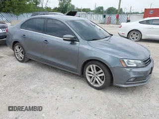 2015 Volkswagen Jetta SEL z VIN 3VWL17AJ4FM354262, wystawiony jako IAAI lot #42453438 z przebiegiem 194 083 mil mil oraz . Historia ofert i sprzedaży dostępna na DreamBid. Obrazek 1.