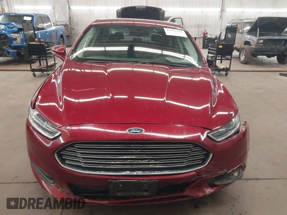 2016 Ford Fusion SE z VIN 1FA6P0H74G5113167, wystawiony jako IAAI lot #41973150 z przebiegiem 192 845 mil mil oraz . Historia ofert i sprzedaży dostępna na DreamBid. Obrazek 13.