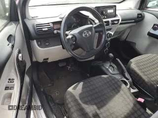 2012 Scion iQ with VIN JTNJJXB03CJ015321, listed as a Copart auction lot 54332355 with 63,439 mi miles and Salvage title. Bid and sale history available at DreamBid. Image 8.