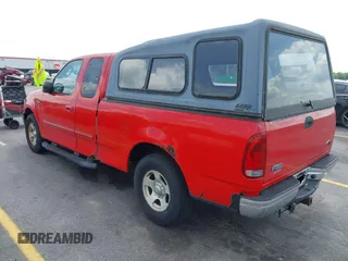 2003 Ford F-150 XL with VIN 1FTRX17243NA84413, listed as a IAAI auction lot 42132813 with 190,715 mi miles. Bid and sale history available at carsss.com. Image 3.