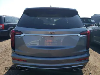 2024 Cadillac XT6 FWD Premium Luxury with VIN 1GYKPCRS7RZ736818, listed as a Copart auction lot 67768804 with 7,145 mi miles and Salvage Title. Bid and sale history available at carsss.com. Image 6.