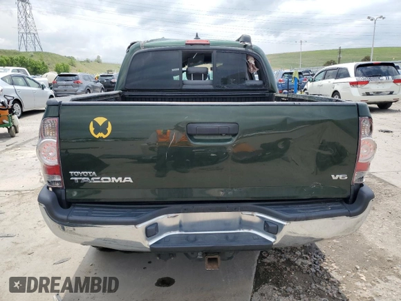2012 Toyota Tacoma z VIN 3TMLU4ENXCM082978, wystawiony jako Copart lot #60069475 z przebiegiem 169 533 mil mil oraz Szkoda całkowita • Salvage title. Historia ofert i sprzedaży dostępna na DreamBid. Obrazek 6.