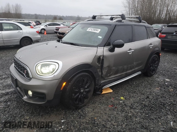 2017 MINI Countryman Cooper S with VIN WMZYT5C33H3D80073, listed as a Copart auction lot 87429094 with 83,566 mi miles and Salvage title. Bid and sale history available at DreamBid. Image 1.