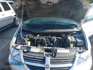 2005 Dodge Caravan SXT with VIN 2D4GP44LX5R540512, listed as a IAAI auction lot 42140912 with 259,855 mi miles and . Bid and sale history available at carsss.com. Image 10.