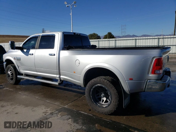 2014 Ram 3500 Laramie with VIN 3C63RRJL6EG165917, listed as a Copart auction lot 81898684 with 207,928 mi miles and Salvage Title. Bid and sale history available at carsss.com. Image 2.