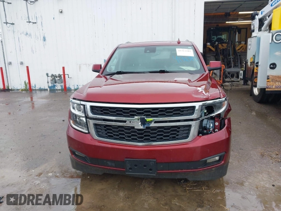2020 Chevrolet Suburban LT with VIN 1GNSKHKC9LR233603, listed as a IAAI auction lot 41311582 with 104,754 mi miles. Bid and sale history available at carsss.com. Image 12.