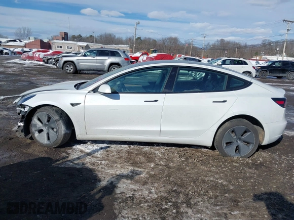 2023 Tesla Model 3 Long Range with VIN 5YJ3E1EBXPF392818, listed as a IAAI auction lot 41346835 with 31,750 mi miles and . Bid and sale history available at DreamBid. Image 14.