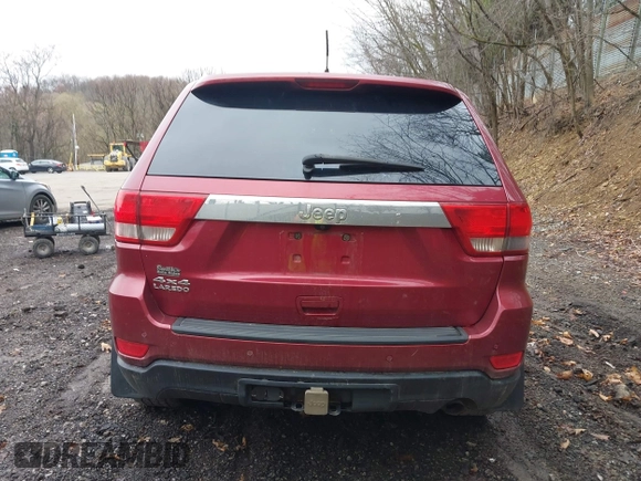 2012 Jeep Grand Cherokee Laredo with VIN 1C4RJFAG7CC123669, listed as a IAAI auction lot 42001472 with 164,806 mi miles. Bid and sale history available at carsss.com. Image 17.