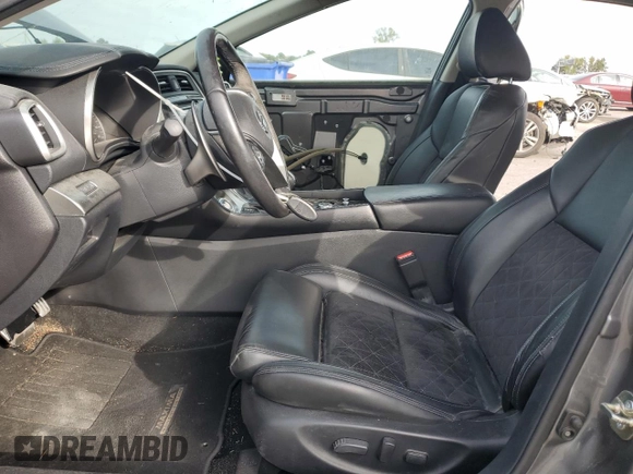 2017 Nissan Maxima Platinum with VIN 1N4AA6AP2HC415210, listed as a Copart auction lot 75491674 with 107,023 mi miles and Salvage title. Bid and sale history available at DreamBid. Image 7.