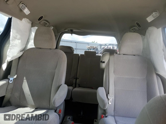 2015 Toyota Sienna LE AAS with VIN 5TDKK3DC8FS582699, listed as a Copart auction lot 56682415 with 195,915 mi miles and Salvage title. Bid and sale history available at DreamBid. Image 10.