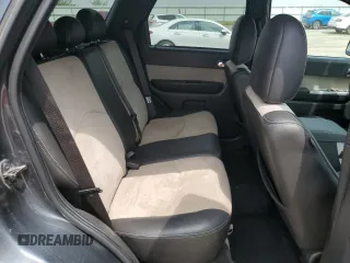2009 Mercury Mariner Premier z VIN 4M2CU87G29KJ08344, wystawiony jako Copart lot #57113485 z przebiegiem 102 748 mil mil oraz Nie do naprawy. Historia ofert i sprzedaży dostępna na DreamBid. Obrazek 11.