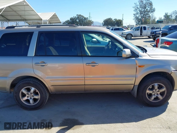 2006 Honda Pilot EX with VIN 5FNYF28416B017534, listed as a IAAI auction lot 41656789 with 241,343 mi miles and . Bid and sale history available at DreamBid. Image 13.