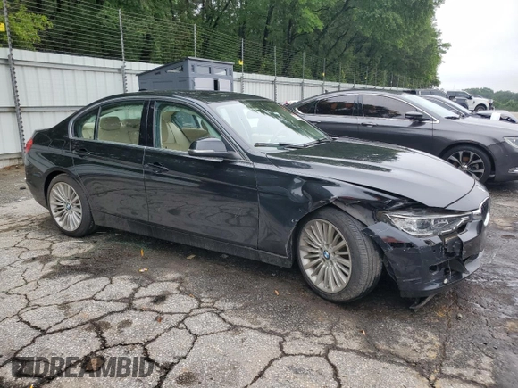2014 BMW 3 Series 328i with VIN WBA3C1C5XEK105543, listed as a Copart auction lot 58548015 with 156,721 mi miles and Salvage title. Bid and sale history available at DreamBid. Image 4.