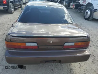 1991 Nissan 240SX z VIN JN1MS34PXMW001053, wystawiony jako Copart lot #79007744 z przebiegiem 172 425 mil mil oraz Nie do naprawy. Historia ofert i sprzedaży dostępna na DreamBid. Obrazek 6.