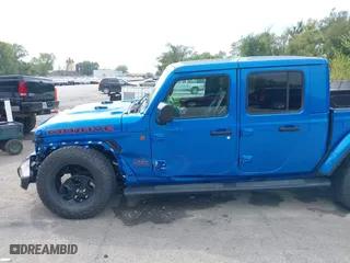 2023 Jeep Gladiator Mojave with VIN 1C6JJTEG0PL593061, listed as a IAAI auction lot 40287955 with 3,930 mi miles. Bid and sale history available at carsss.com. Image 6.