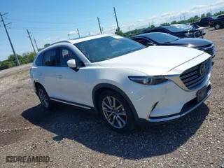 2016 Mazda CX-9 Grand Touring with VIN JM3TCBDY7G0125708, listed as a IAAI auction lot 39891843 with 133,988 mi miles. Bid and sale history available at carsss.com. Image 1.
