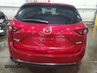 2018 Mazda CX-5 Grand Touring with VIN JM3KFBDM5J0454026, listed as a Copart auction lot 60672315 with 12,292 mi miles and Salvage title. Bid and sale history available at DreamBid. Image 6.