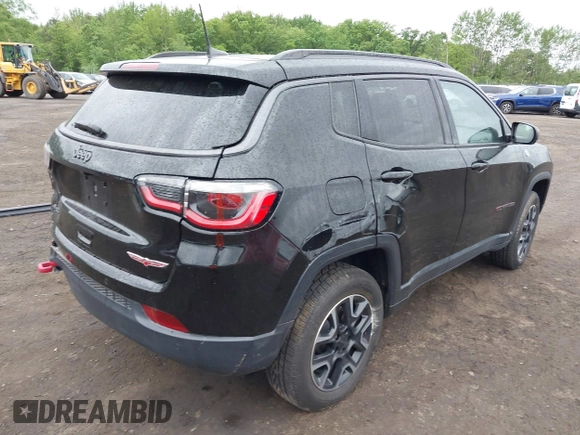 2019 Jeep Compass Trailhawk with VIN 3C4NJDDB7KT727762, listed as a IAAI auction lot 42299260 with 56,733 mi miles and . Bid and sale history available at DreamBid. Image 18.