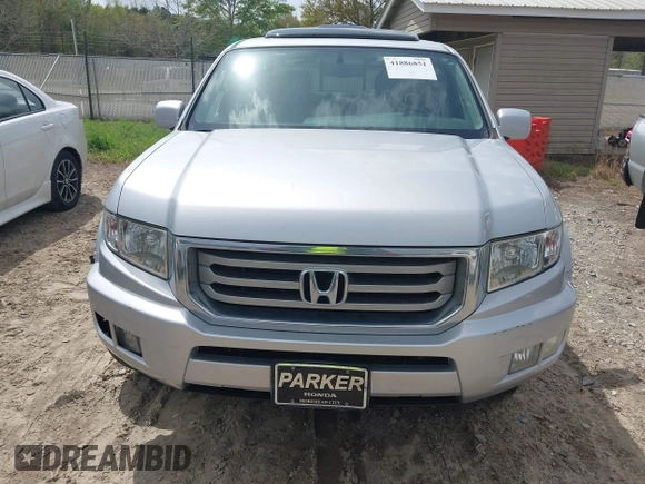 2014 Honda Ridgeline RTL with VIN 5FPYK1F53EB013752, listed as a IAAI auction lot 41886851 with 89,038 mi miles and . Bid and sale history available at DreamBid. Image 6.