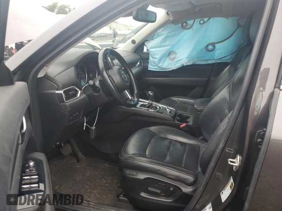 2018 Mazda CX-5 Grand Touring с VIN JM3KFBDM8J0424633, выставлен на аукционе Copart как лот 59888035 с пробегом 77 721 миль миль и Списание • Salvage title. История ставок и продаж доступна на DreamBid. Изображение 7.