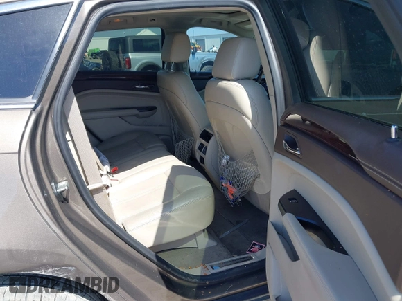 2015 Cadillac SRX Performance Collection with VIN 3GYFNCE31FS598109, listed as a IAAI auction lot 41788267 with 172,488 mi miles and . Bid and sale history available at DreamBid. Image 8.