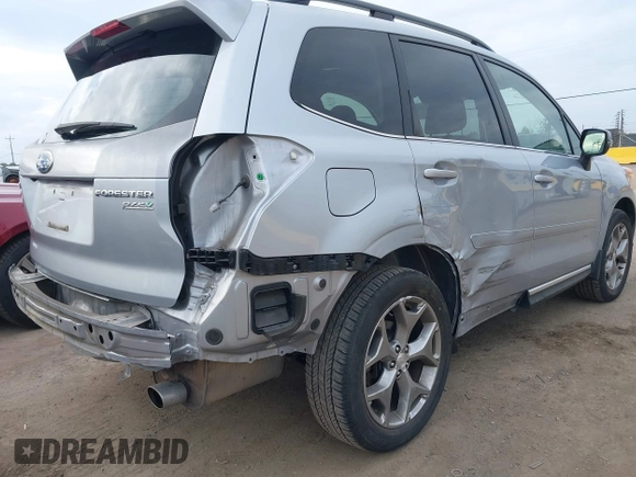 2016 Subaru Forester 2.5i Touring with VIN JF2SJAXCXGH522837, listed as a IAAI auction lot 41562541 with 106,720 mi miles. Bid and sale history available at carsss.com. Image 6.