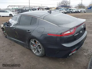 2018 Kia Stinger GT with VIN KNAE35LC4J6027939, listed as a IAAI auction lot 41790058 with 82,723 mi miles. Bid and sale history available at carsss.com. Image 3.