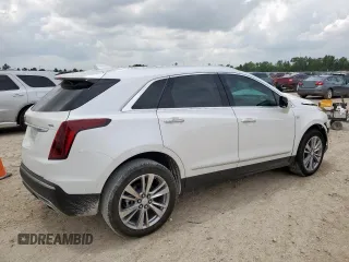 2024 Cadillac XT5 FWD Premium Luxury with VIN 1GYKNCRS9RZ706158, listed as a Copart auction lot 60455055 with 7,999 mi miles and Salvage title. Bid and sale history available at DreamBid. Image 3.
