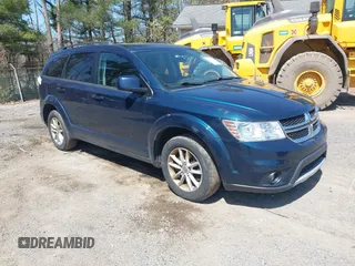 2015 Dodge Journey SXT with VIN 3C4PDDBG1FT701081, listed as a IAAI auction lot 42041392 with 199,683 mi miles and . Bid and sale history available at DreamBid. Image 1.