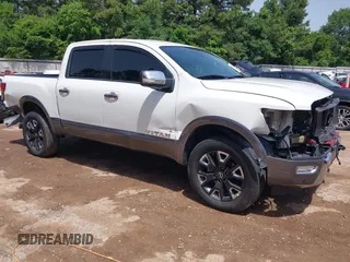 2024 Nissan Titan Pro-4X with VIN 1N6AA1ED7RN101486, listed as a IAAI auction lot 42243136 with 39,223 mi miles and . Bid and sale history available at DreamBid. Image 1.