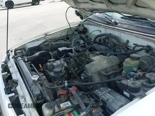 2000 Toyota Tacoma with VIN 4TANL42NXYZ669344, listed as a IAAI auction lot 43166092 with 147,844 mi miles and . Bid and sale history available at DreamBid. Image 18.
