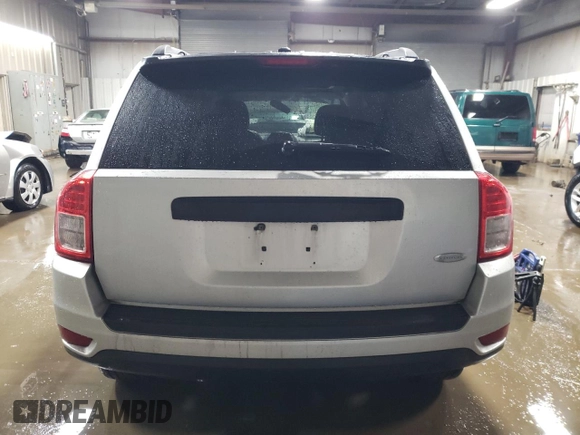 2011 Jeep Compass with VIN 1J4NT1FB7BD272109, listed as a Copart auction lot 86604064 with 0 mi miles and Salvage Title. Bid and sale history available at carsss.com. Image 6.