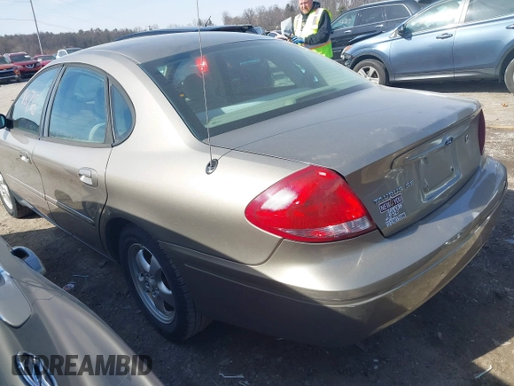 2004 Ford Taurus SE with VIN 1FAFP532X4G152810, listed as a IAAI auction lot 41639876 with 98,718 mi miles and . Bid and sale history available at DreamBid. Image 3.