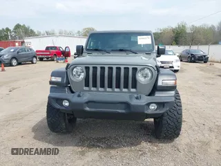 2021 Jeep Wrangler Sport z VIN 1C4GJXAN3MW550665, wystawiony jako IAAI lot #41902279 z przebiegiem 32 250 mil mil oraz . Historia ofert i sprzedaży dostępna na DreamBid. Obrazek 12.