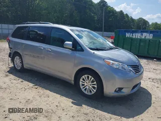 2014 Toyota Sienna XLE with VIN 5TDYK3DC0ES453204, listed as a IAAI auction lot 42535234 with 125,287 mi miles and . Bid and sale history available at DreamBid. Image 1.