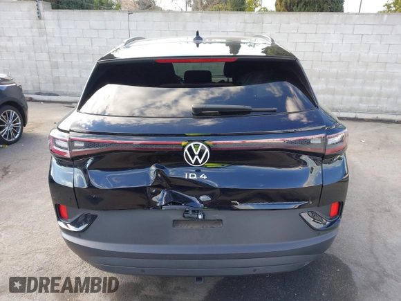 2023 Volkswagen ID.4 Pro z VIN 1V2DNPE85PC028748, wystawiony jako IAAI lot #41348983 z przebiegiem 7 434 mil mil oraz . Historia ofert i sprzedaży dostępna na DreamBid. Obrazek 16.