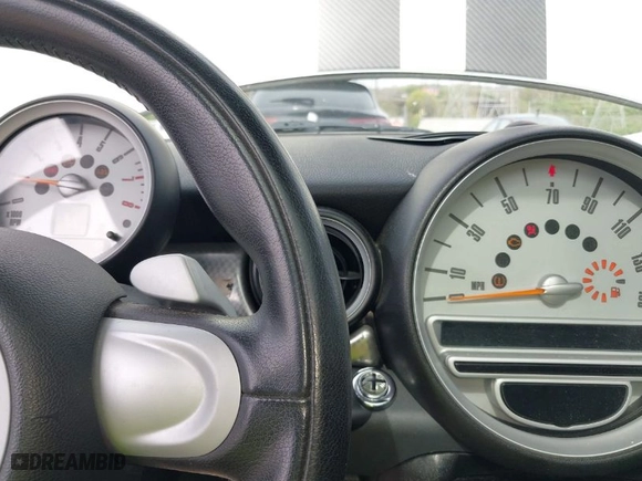 2008 MINI Cooper Hardtop S with VIN WMWMF73578TV33406, listed as a IAAI auction lot 42081596 with 120,183 mi miles. Bid and sale history available at carsss.com. Image 7.