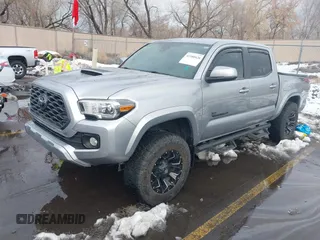2021 Toyota Tacoma SR z VIN 3TMCZ5AN0MM386867, wystawiony jako IAAI lot #41580426 z przebiegiem 46 559 mil mil oraz . Historia ofert i sprzedaży dostępna na DreamBid. Obrazek 19.