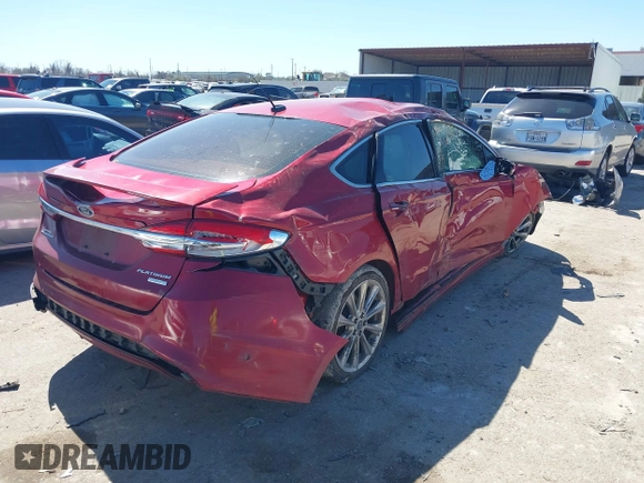 2017 Ford Fusion Titanium with VIN 3FA6P0K90HR184777, listed as a IAAI auction lot 41722188 with 116,654 mi miles. Bid and sale history available at carsss.com. Image 4.