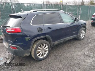 2016 Jeep Cherokee Limited with VIN 1C4PJMDB2GW181432, listed as a IAAI auction lot 41675868 with 106,979 mi miles. Bid and sale history available at carsss.com. Image 4.