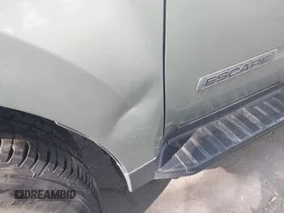 2008 Ford Escape Hybrid with VIN 1FMCU49H38KD84434, listed as a IAAI auction lot 42609764 with 224,469 mi miles and . Bid and sale history available at DreamBid. Image 12.