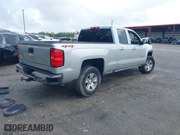 2019 Chevrolet Silverado 1500 LT with VIN 2GCVKPECXK1158607, listed as a IAAI auction lot 41116624 with 72,822 mi miles and . Bid and sale history available at DreamBid. Image 4.