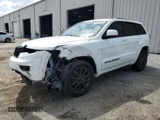 2018 Jeep Grand Cherokee Altitude with VIN 1C4RJEAG1JC306461, listed as a Copart auction lot 61711274 with 80,076 mi miles and Salvage title. Bid and sale history available at DreamBid. Image 1.