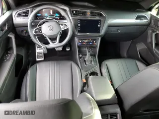 2023 Volkswagen Tiguan SE R-Line Black with VIN 3VVCB7AX9PM131559, listed as a Copart auction lot 44711665 with 28,166 mi miles and Salvage Title. Bid and sale history available at carsss.com. Image 8.